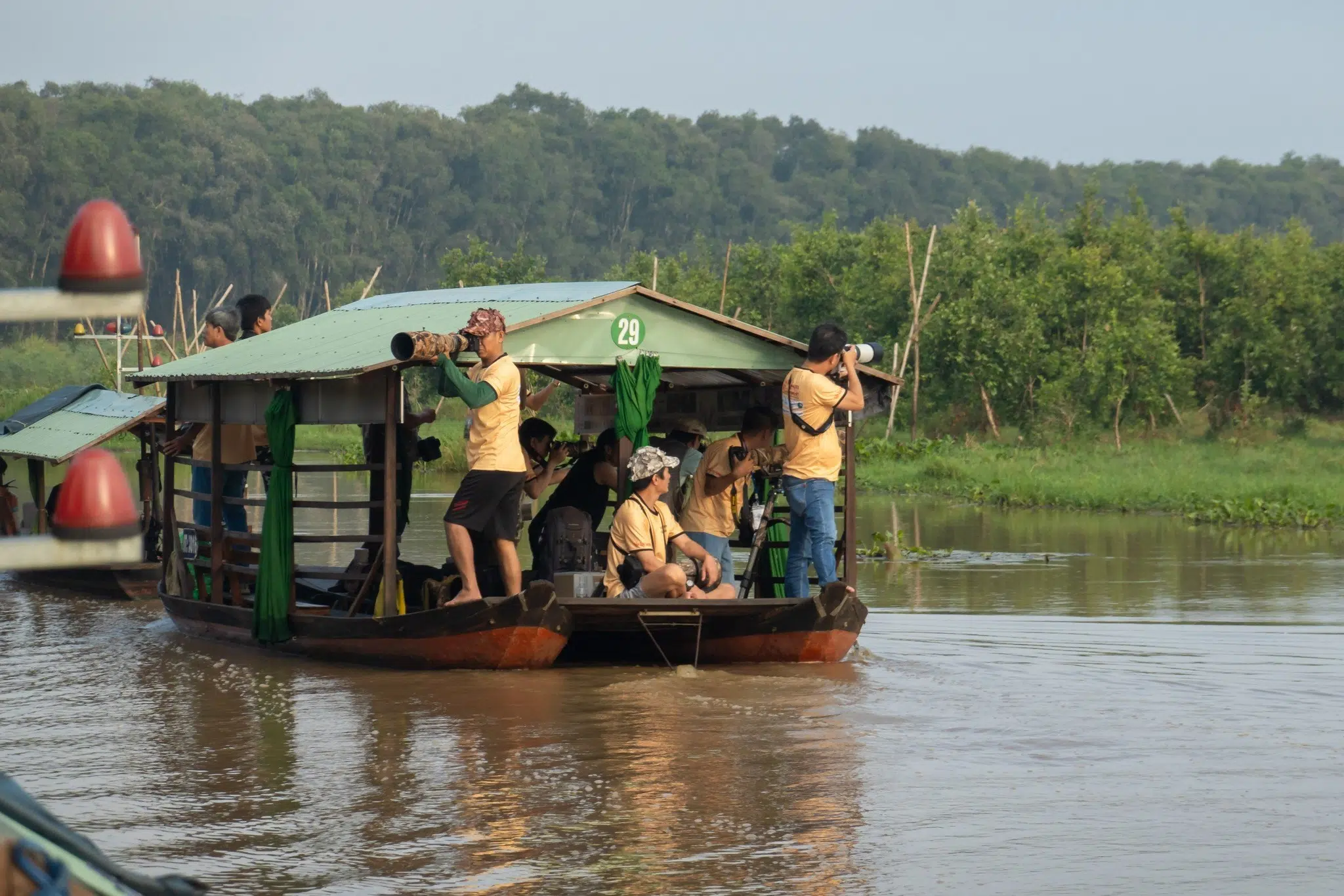 Vietnam Bird Race Team on boat at Tram Chim National Park